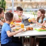 children eating in a cafeteria