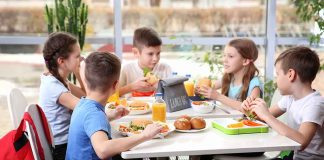 children eating in a cafeteria