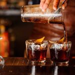 bartender pouring cocktails