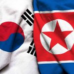 South Korean and North Korean flags side by side.