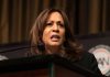 Kamala Harris makes a face while at a podium