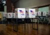 Voting booths set up in a room.