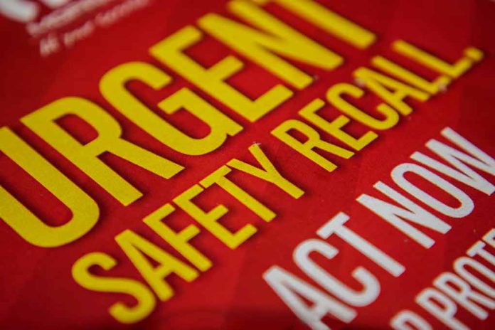 "Urgent safety recall sign in bold letters."