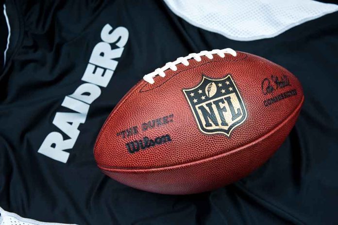 football on a Las Vegas Raiders jersey