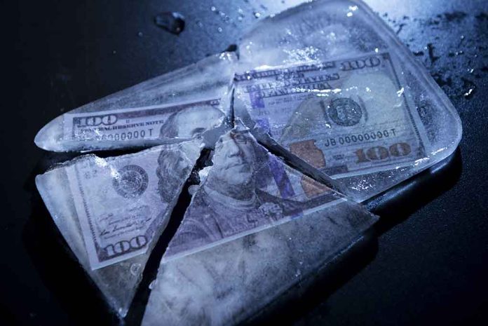 Hundred-dollar bills frozen in cracked ice block.