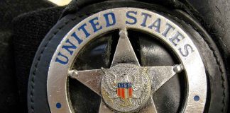 United States Marshal badge close-up.