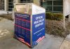 Official mail ballot drop box outside building.