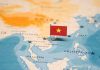 map of Asia with a tiny flag representing Vietnam