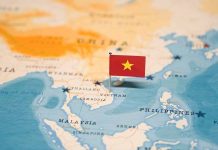 map of Asia with a tiny flag representing Vietnam