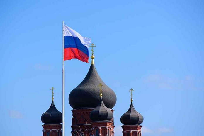 Russian flag next to church domes.