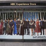 poster of the Saturday Night Live cast in a store window