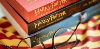 Harry Potter books with round glasses on fabric.