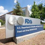 FDA building sign with blue sky background.