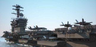 Aircraft carrier deck with jet planes.