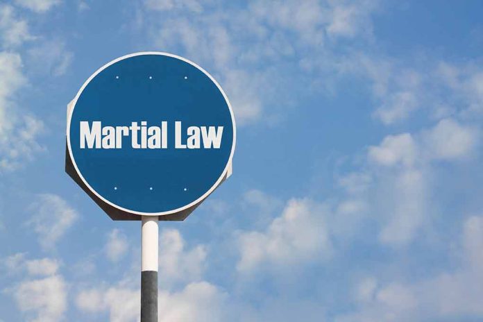 Martial Law sign against blue sky background