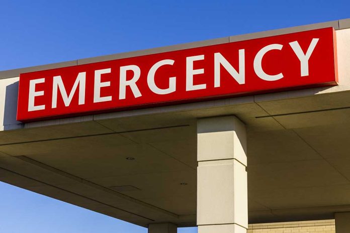 Red "EMERGENCY" sign on building facade.