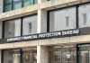 "Consumer Financial Protection Bureau building entrance sign."