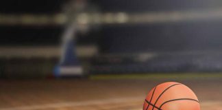 Basketball on a basketball court with blurred background