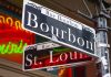 Bourbon and St Louis street signs with neon lights