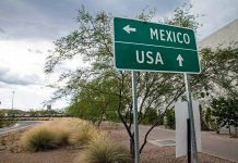 Directional sign for Mexico and USA.