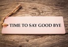 Sign reads "TIME TO SAY GOOD BYE" on wood.