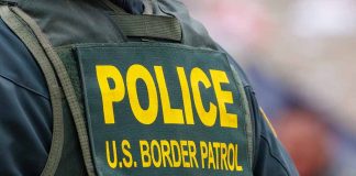 "Police U.S. Border Patrol uniform close-up."