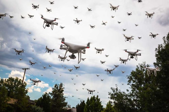 Many drones flying in a cloudy sky.