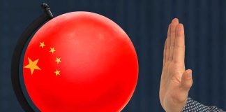 globe with in image of China's flag superimposed on it, next to an upturned hand.