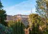 Hollywood sign on hillside surrounded by trees