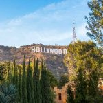 Hollywood sign on hillside surrounded by trees