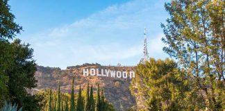 Hollywood sign on hillside surrounded by trees
