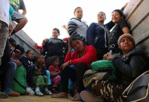Group of people sitting in a truck