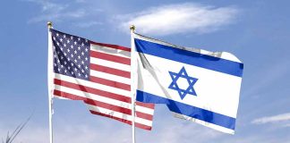 American and Israeli flags waving in the wind