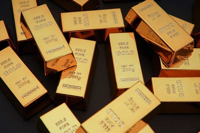 1918648541 featured image Gold bars stacked on dark background