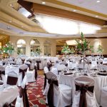 Elegant banquet hall set for a formal event.