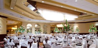 Elegant banquet hall set for a formal event.