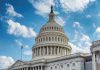 US Capitol building dome under clear blue sky