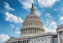US Capitol building dome under clear blue sky