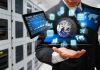 Businessman holding virtual data and analytics hologram