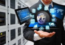 Businessman holding virtual data and analytics hologram