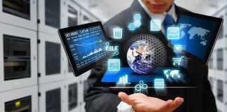 Businessman holding virtual data and analytics hologram