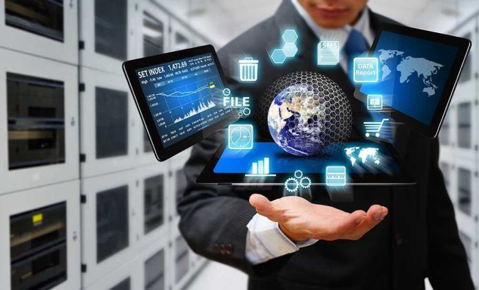 152663261 Businessman holding virtual data and analytics hologram
