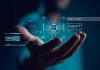 Hand holding digital AI and ChatGPT graphics