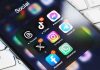 Smartphone showing social media app icons in a folder