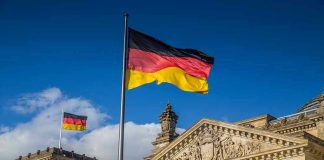 German flags at the Reichstag building in Berlin