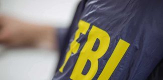 FBI jacket with yellow lettering
