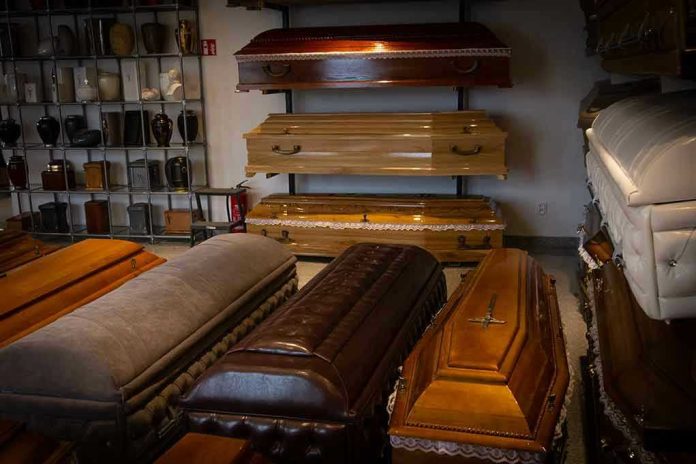 1562591803 Showroom with coffins and urns.