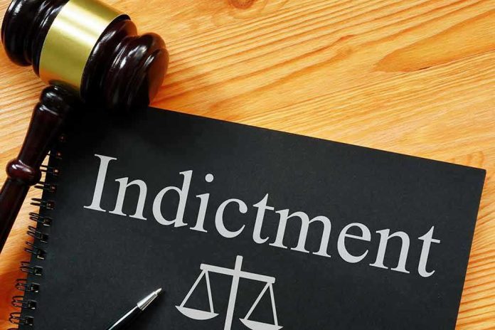 2138821999 Gavel next to indictment document on table
