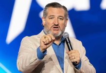 Cruz UNLEASHES Attack — Greene Gets Crushed! Man speaking passionately into a microphone on stage.