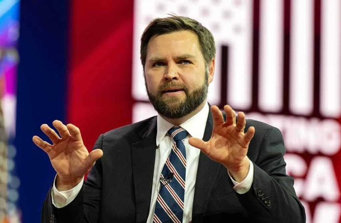 2270811625 Man in suit gesturing with hands on stage.